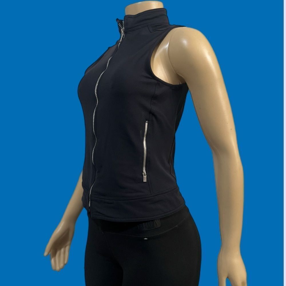 Bebe Sport Vest Full Zipper closure side pockets black New without tags Small